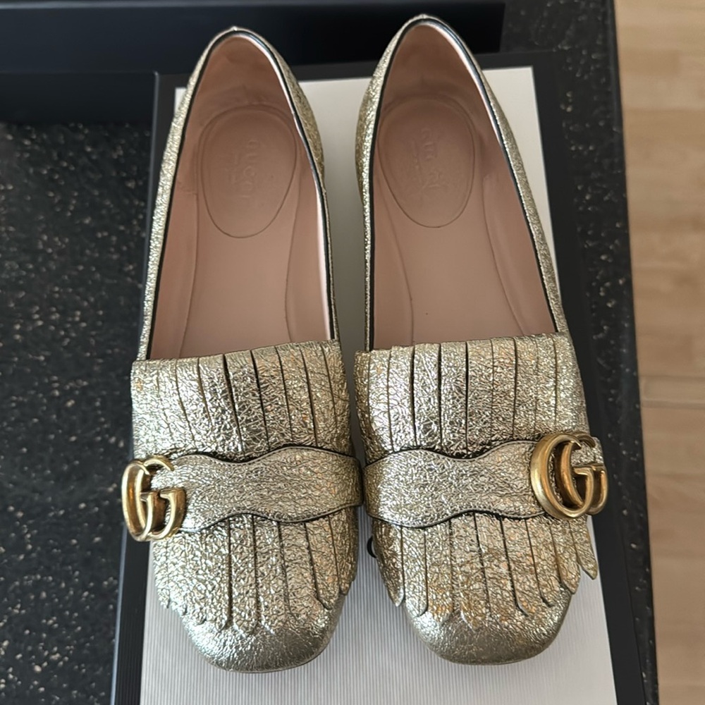 Golden Gucci shoes 
Used - worn - selling as is